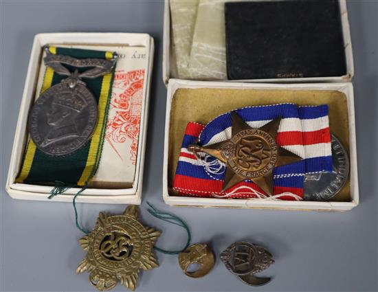 A Territorial Fox Efficiency medal, two WW2 medals and badges etc